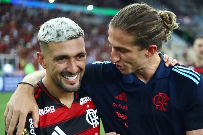 Arrascaeta e o técnico Filipe Luís