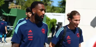Rossi, Gerson e Filipe Luís em embarque do Flamengo