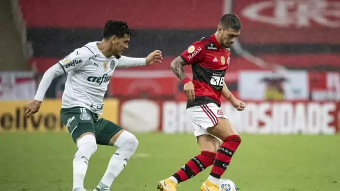 Arrascaeta e Gustavo Gomes em campo no Flamengo x Palmeiras