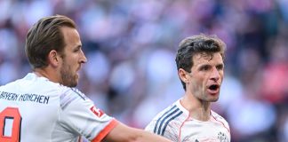 Harry Kane e Thomas Müller em jogo do Bayern