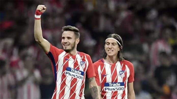 Saúl Ñíguez e Filipe Luís em campo pelo Atlético de Madrid