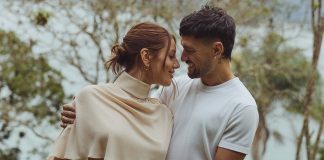 Arrascaeta e sua esposa Camila Bastiani, grávida de um menino