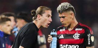 Filipe Luís e Carrascal durante jogo entre Flamengo e Racing