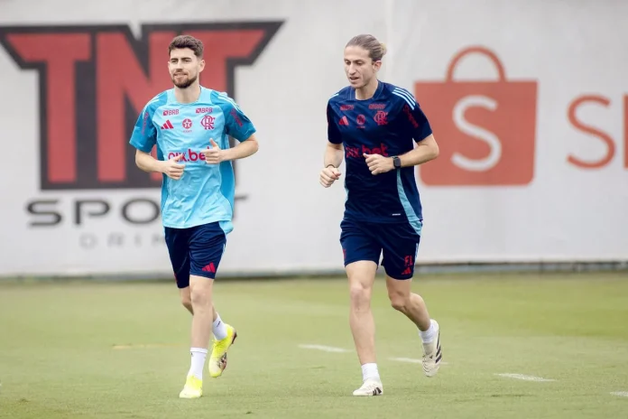 Jorginho, jogador do flamengo, e ex técnico do clube, Filipe Luís