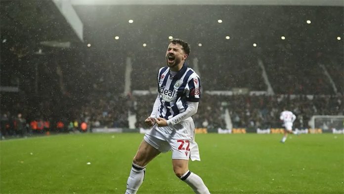 Michael Johnston, em campo pelo West-Bromwich